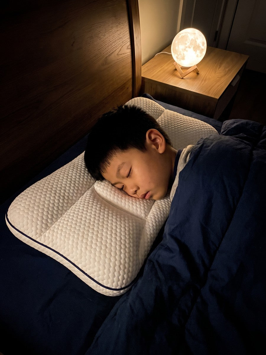 A child fast asleep on Nimbo